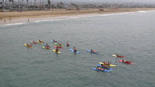 newport beach junior lifeguards paddle boards