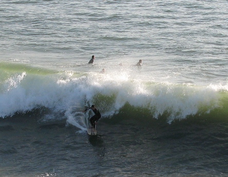 Surfing at HB PIer