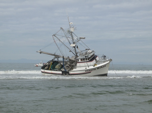 Boat beached in Huntington Beach