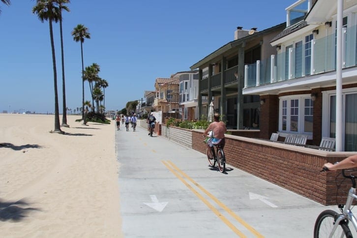 Lifestyle In Newport Beach Riding Your Bike On The Boardwalk